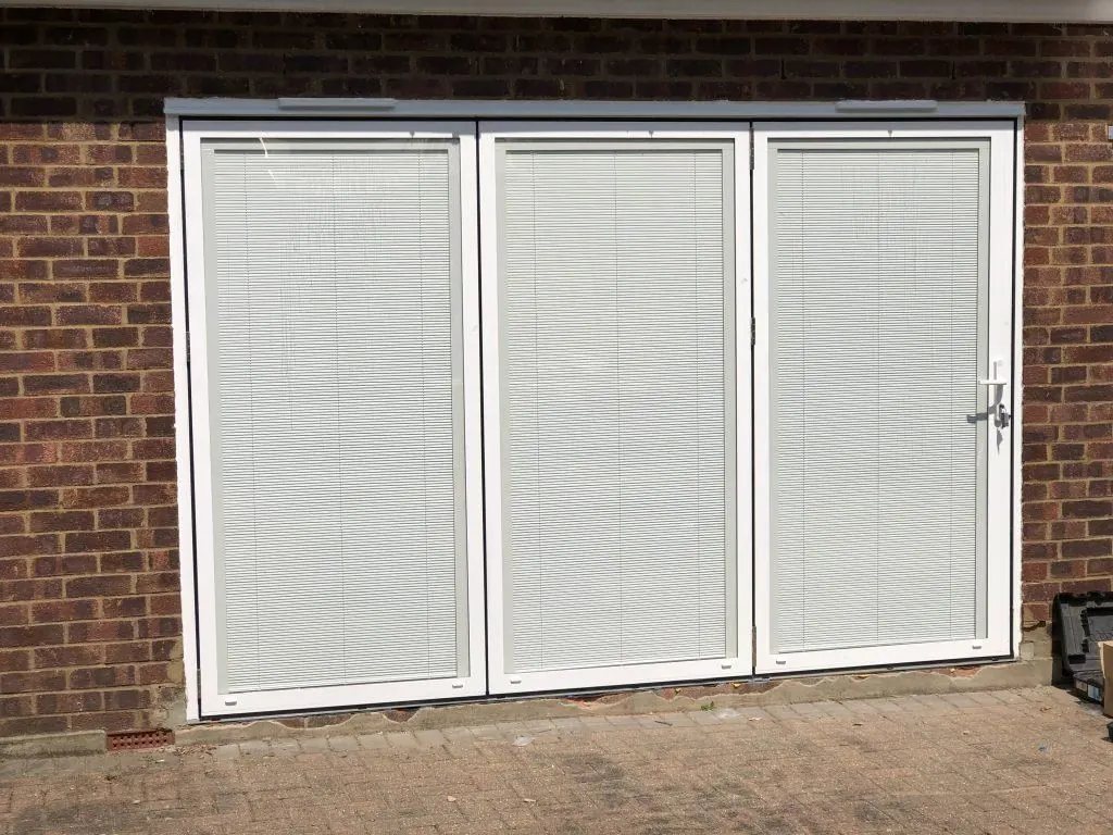 Aluminium bifold doors with integral blinds