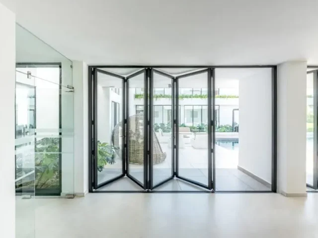 Aluminium bifold doors in a bright living room