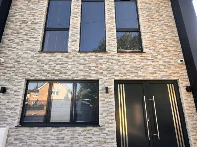 Modern North London home fitted with grey aluminium windows and a contemporary front door by Ada Windows
