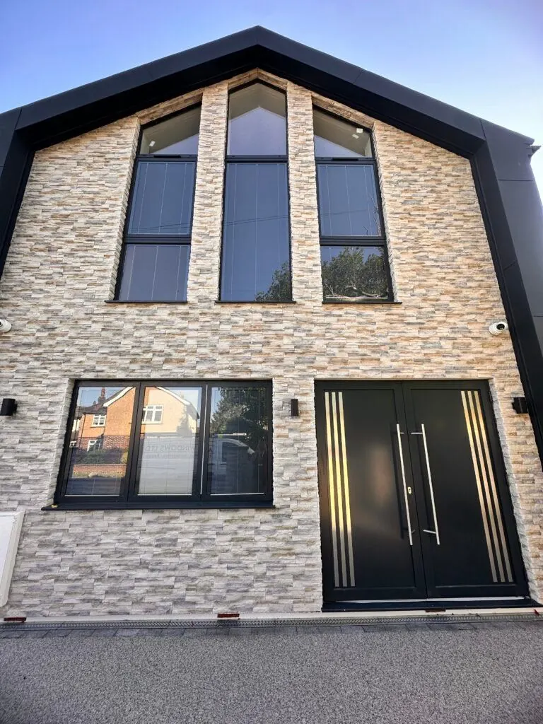 Modern North London home fitted with grey aluminium windows and a contemporary front door by Ada Windows