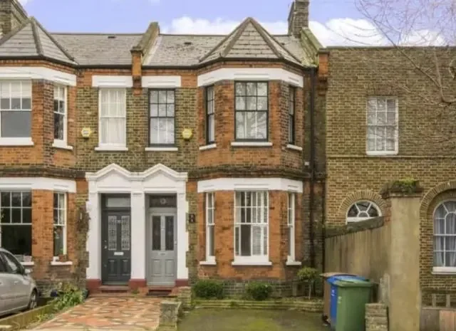 Victorian terraced houses in North London with replacement windows and doors
